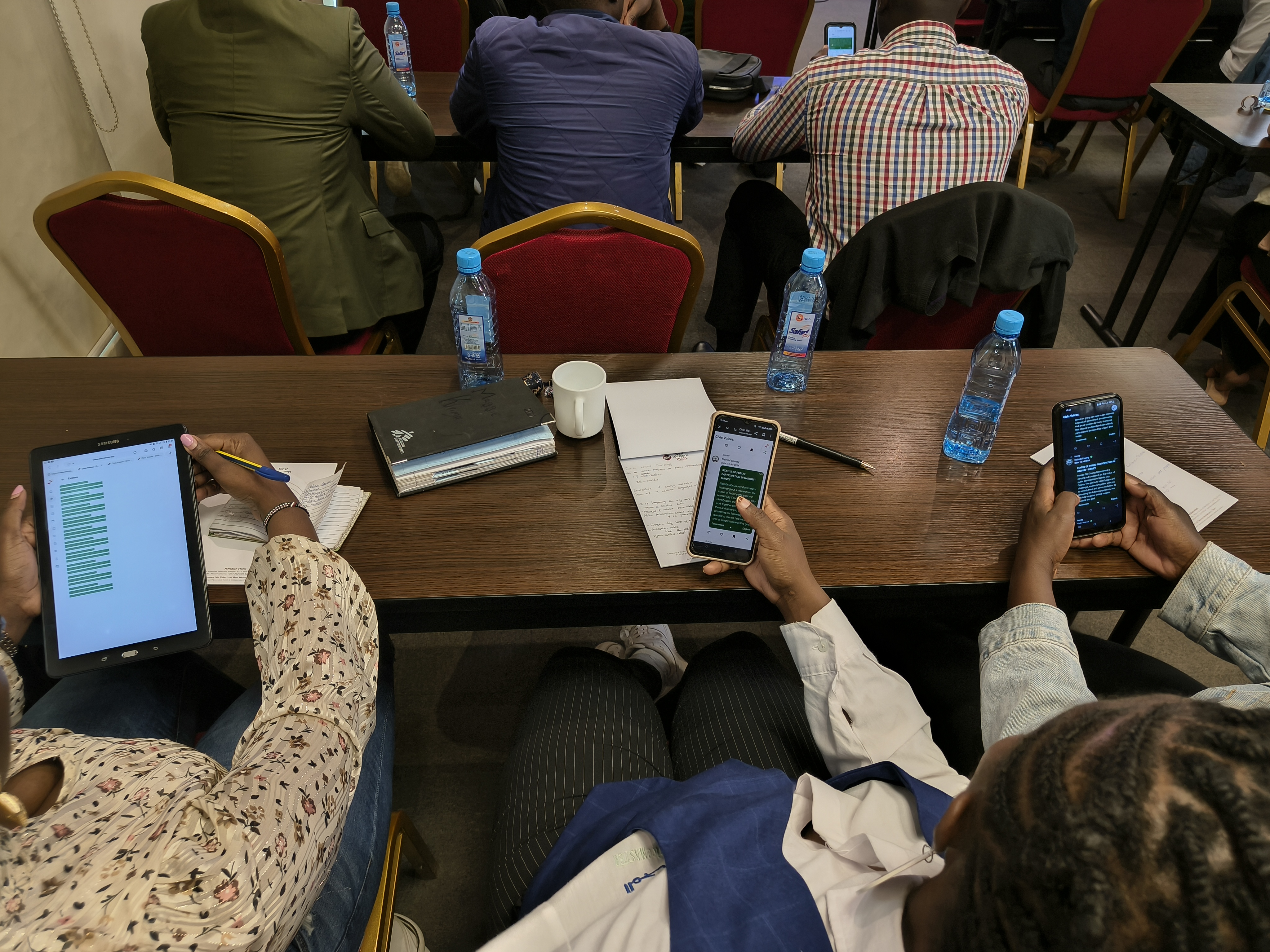 A photorealistic image of a diverse group of volunteers participating in a community cleanup event. The setting is a local park, with volunteers picking up trash and planting flowers. The lighting is bright and optimistic, conveying a sense of energy and enthusiasm. The camera angle is a wide shot, capturing the entire scene and the collaborative spirit of the volunteers. Technical specs: 4K resolution, high quality, photorealistic.